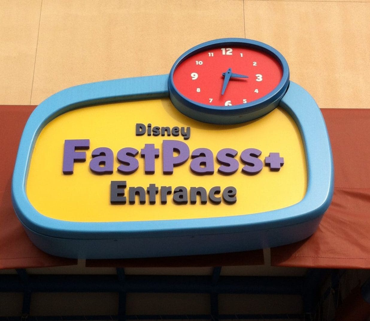 A sign that says disney fastpass + entrance.