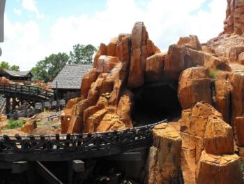A view of the entrance to a ride at a theme park.